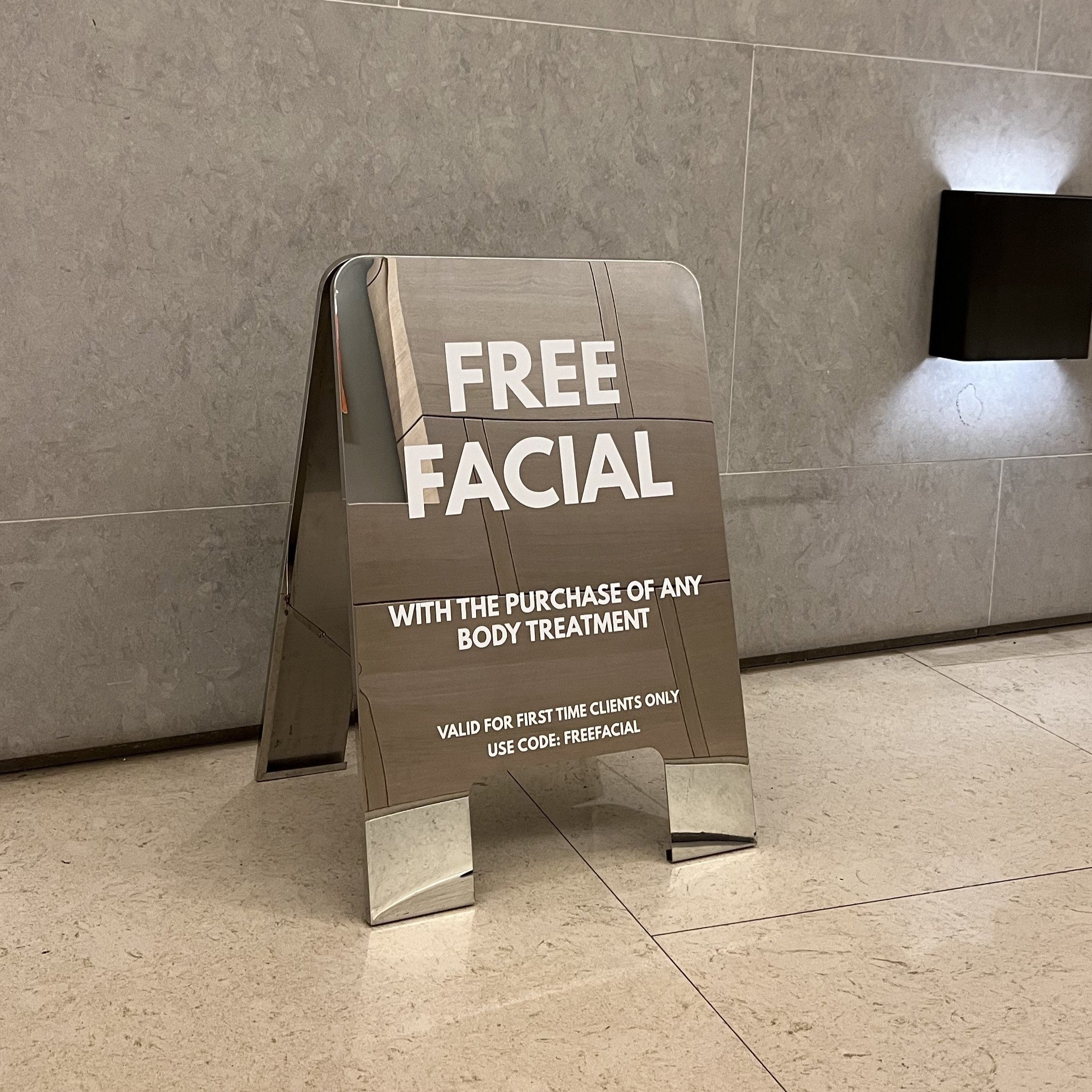 The Tox Mirrored Rounded Sidewalk Sign