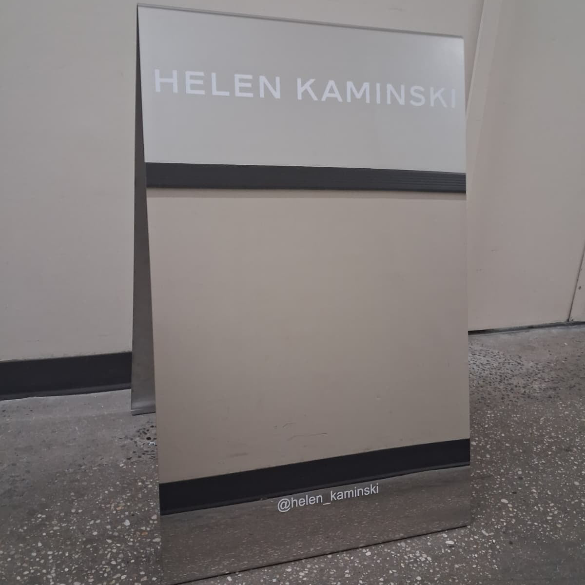 Helen Kaminski Mirrored Stainless Steel Sign