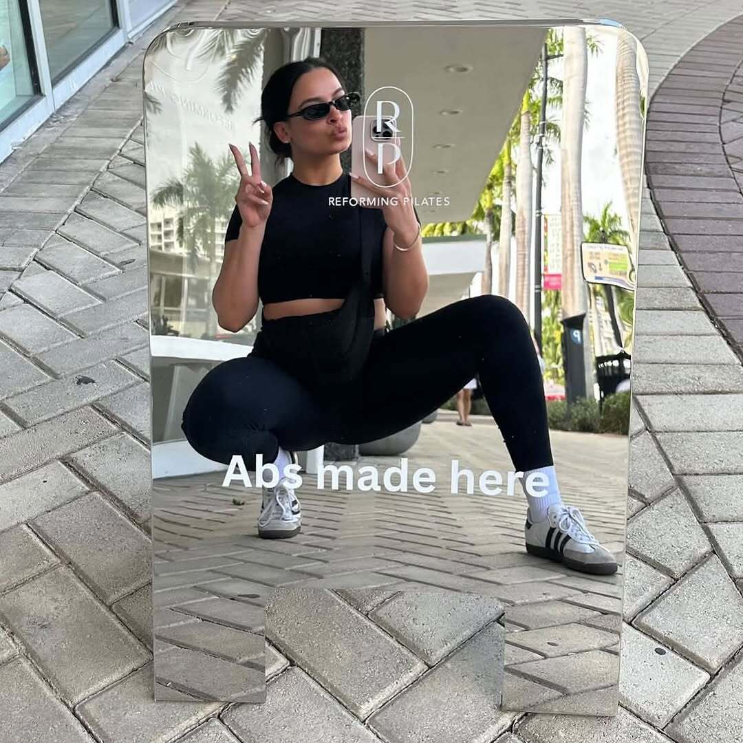 A Frame Sidewalk Sign Mirrored for Reforming Pilates