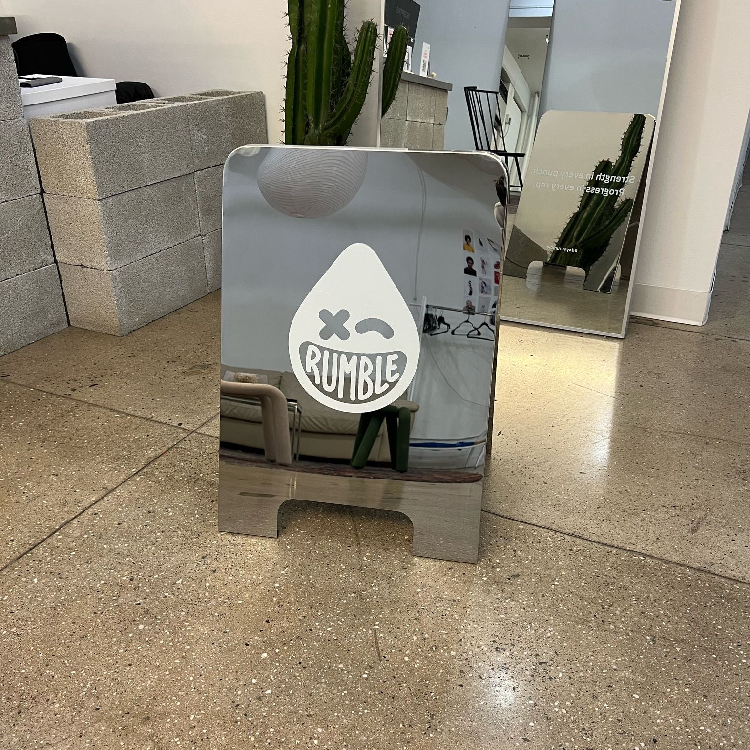 Rumble Boxing Courthouse - Mirrored Rounded Stainless Steel A-Frame Sandwich Board Sign