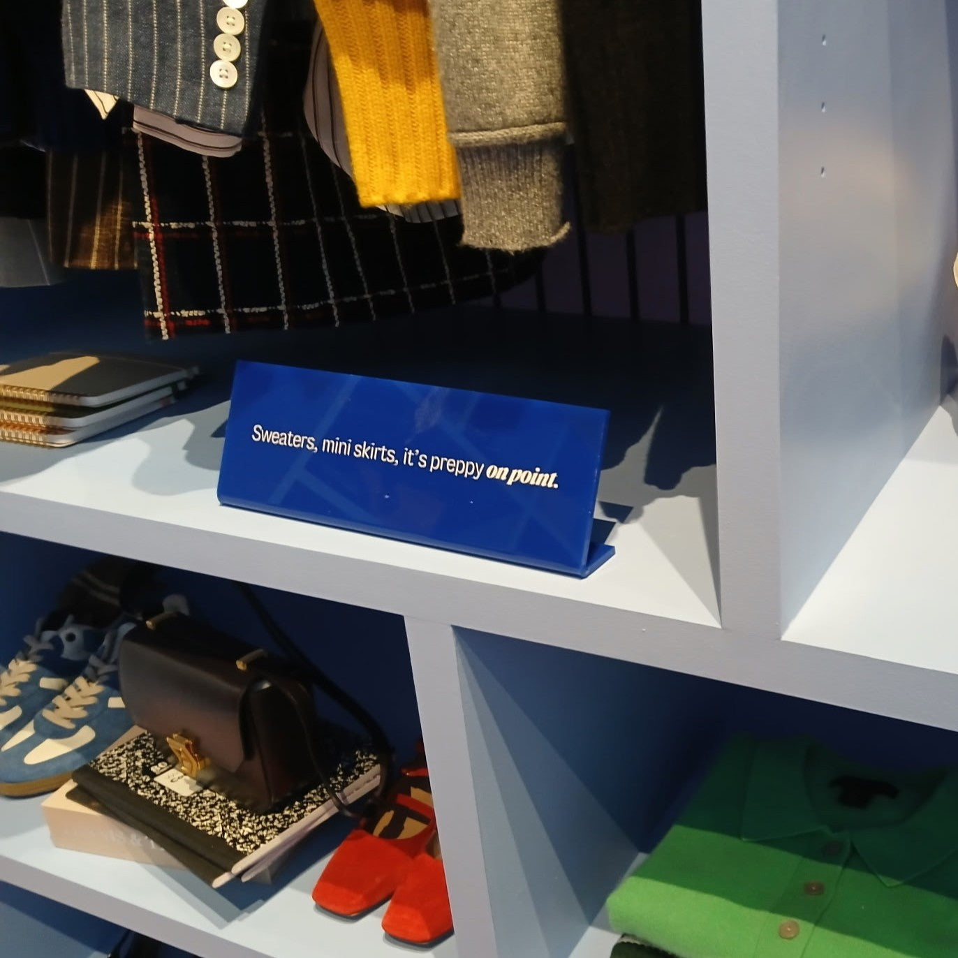 Opaque acrylic table top sign stand with solid finish