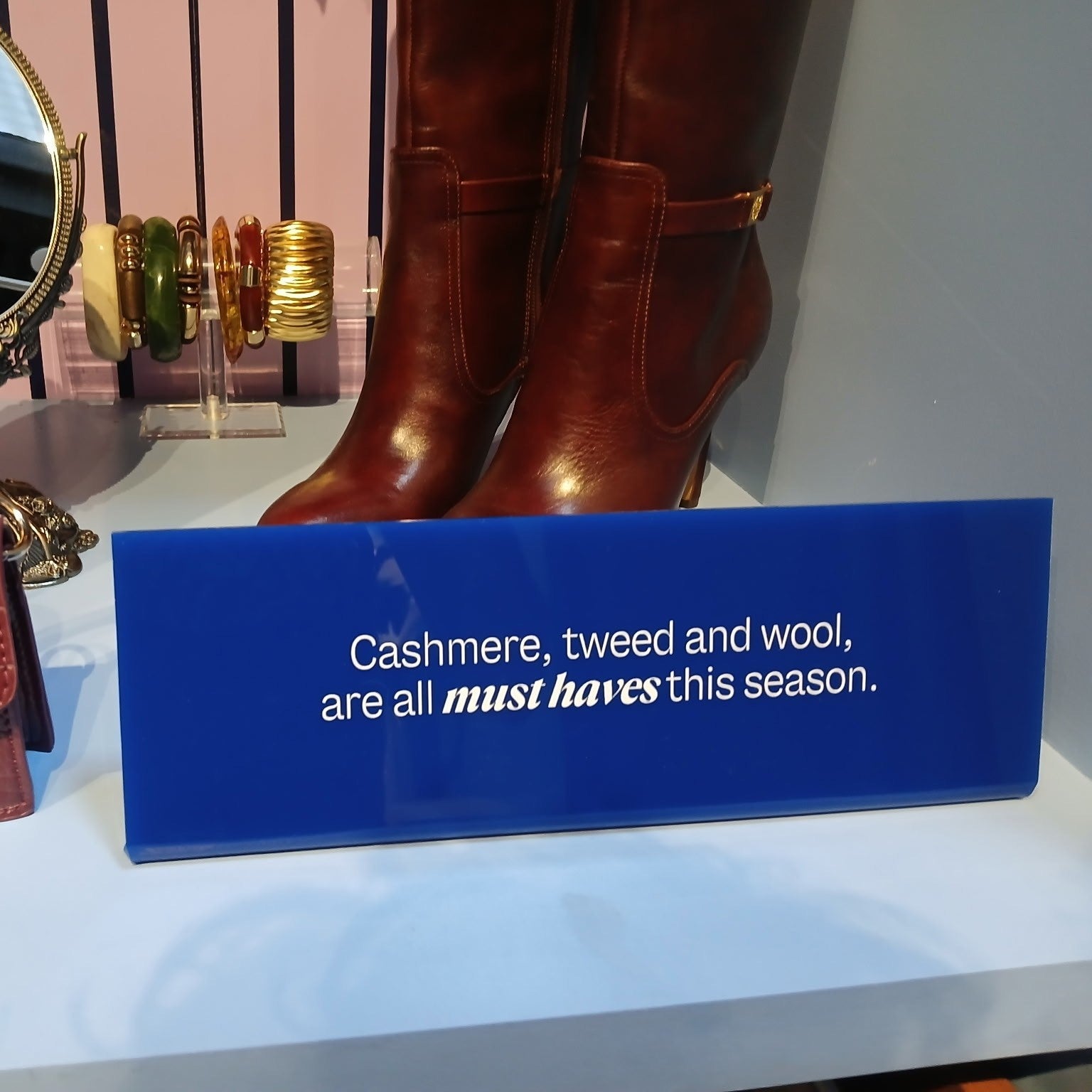 Opaque acrylic table top sign stand with solid finish