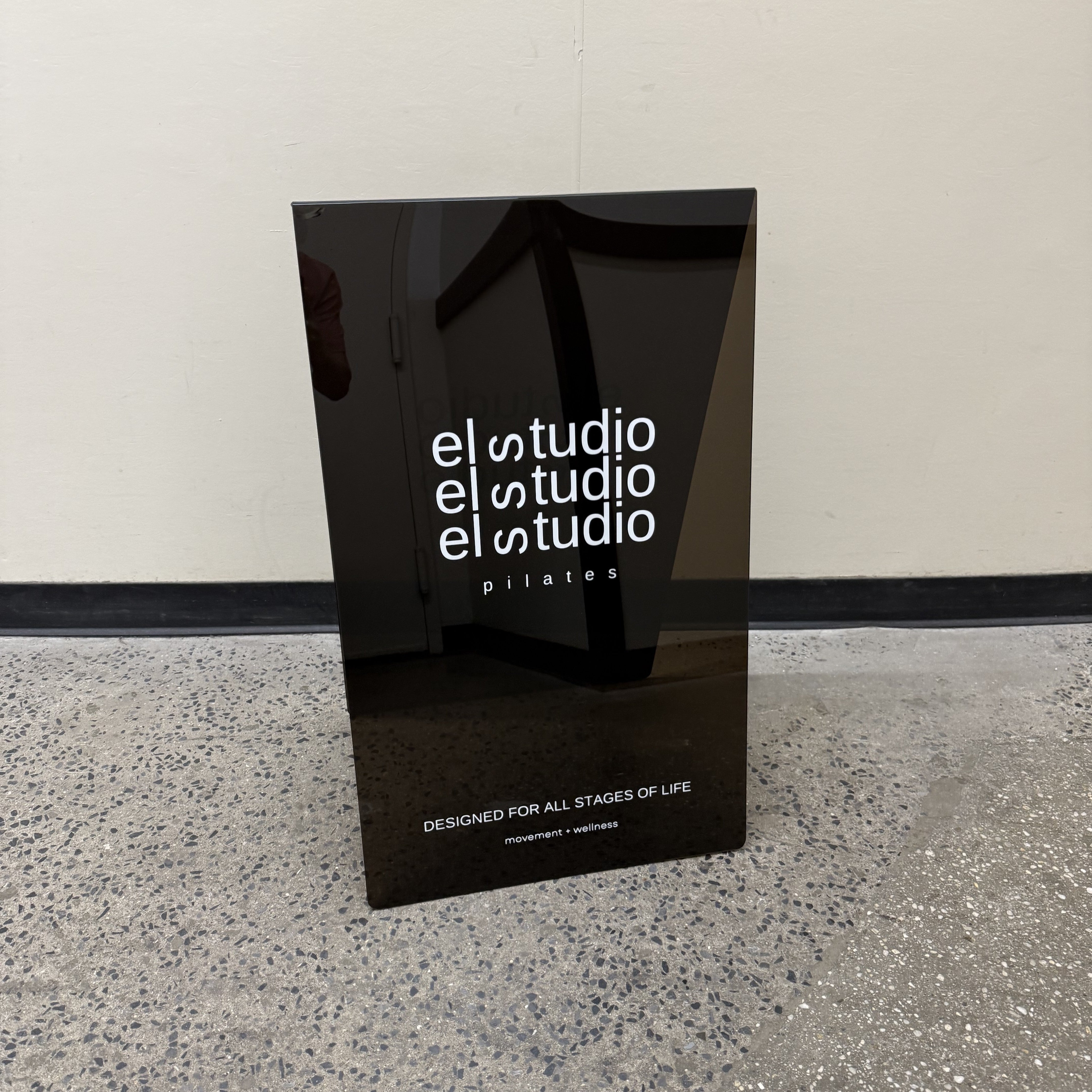 Transparent acrylic A-frame sidewalk sign for clear visibility