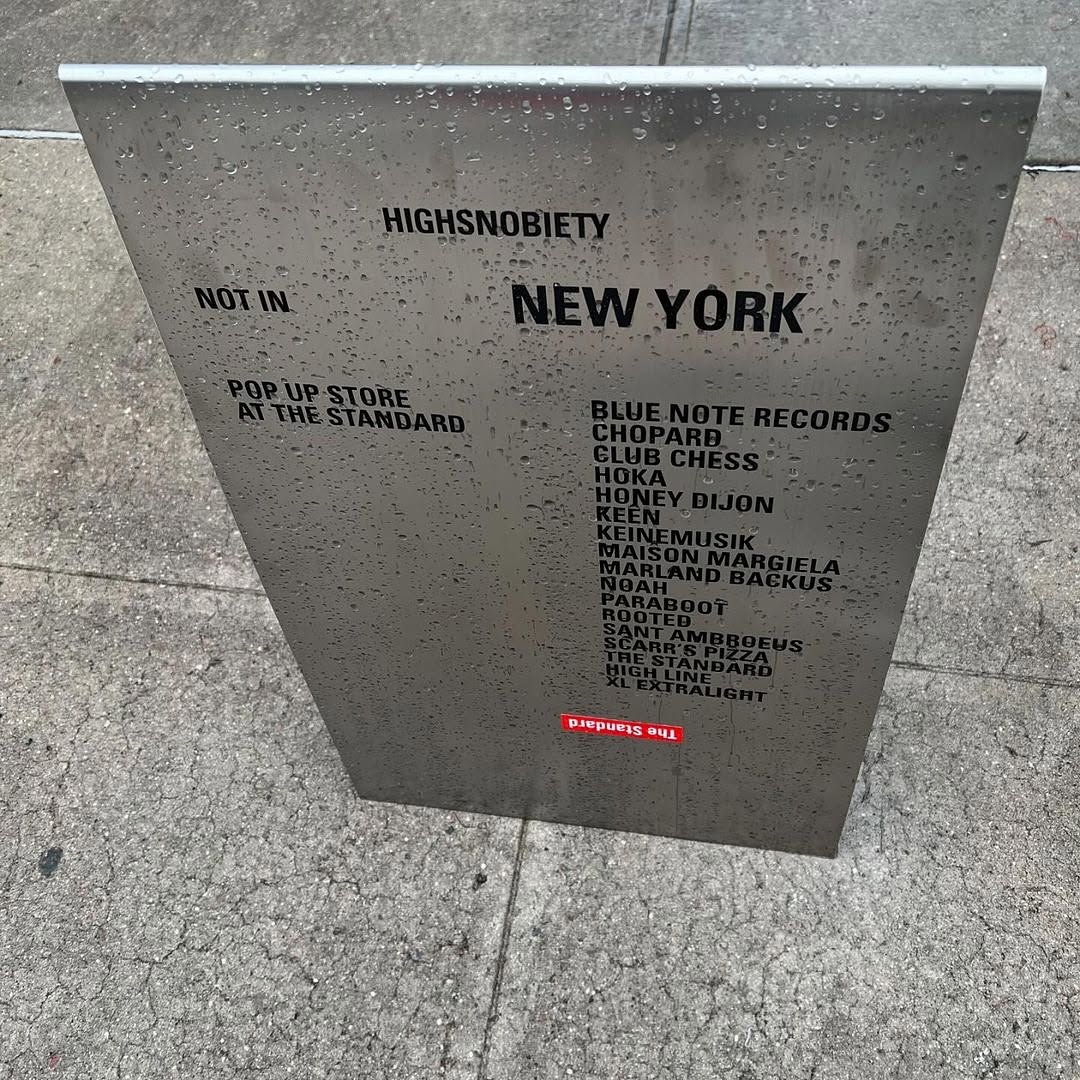 Brushed stainless steel A-frame sidewalk sign with modern finish