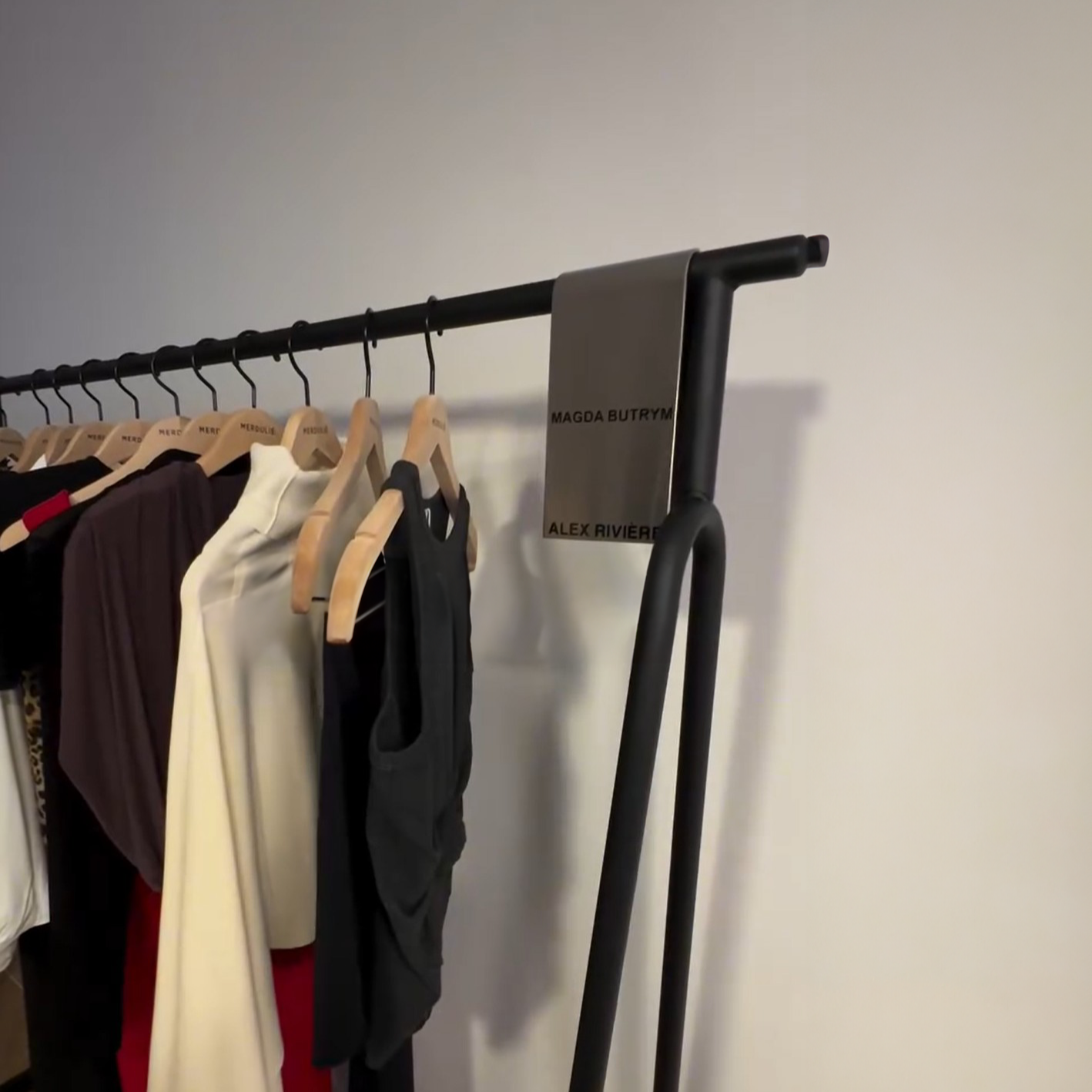 Stainless steel clothing rack sign clip for retail display