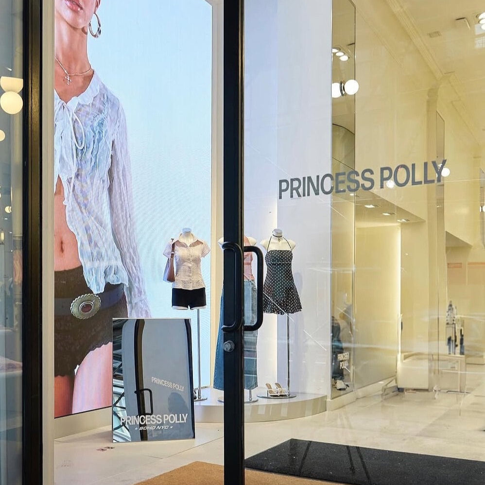 Mirrored stainless steel A-frame sidewalk sign with reflective surface