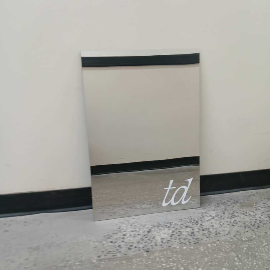 Stainless steel leaning wall panel sign for interior display