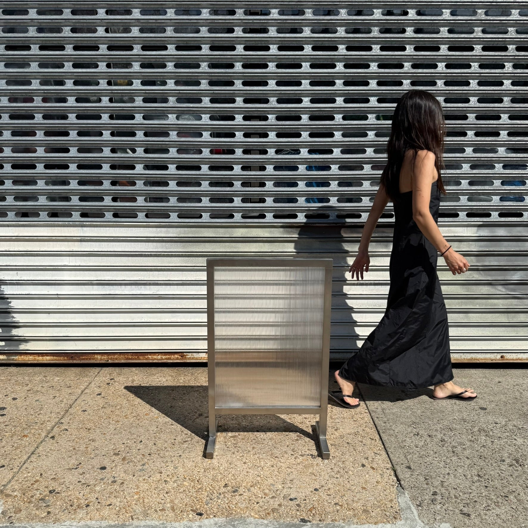 Transparent_Brushed_Stainless_Steel_Standing_Sign_Front_View_Person