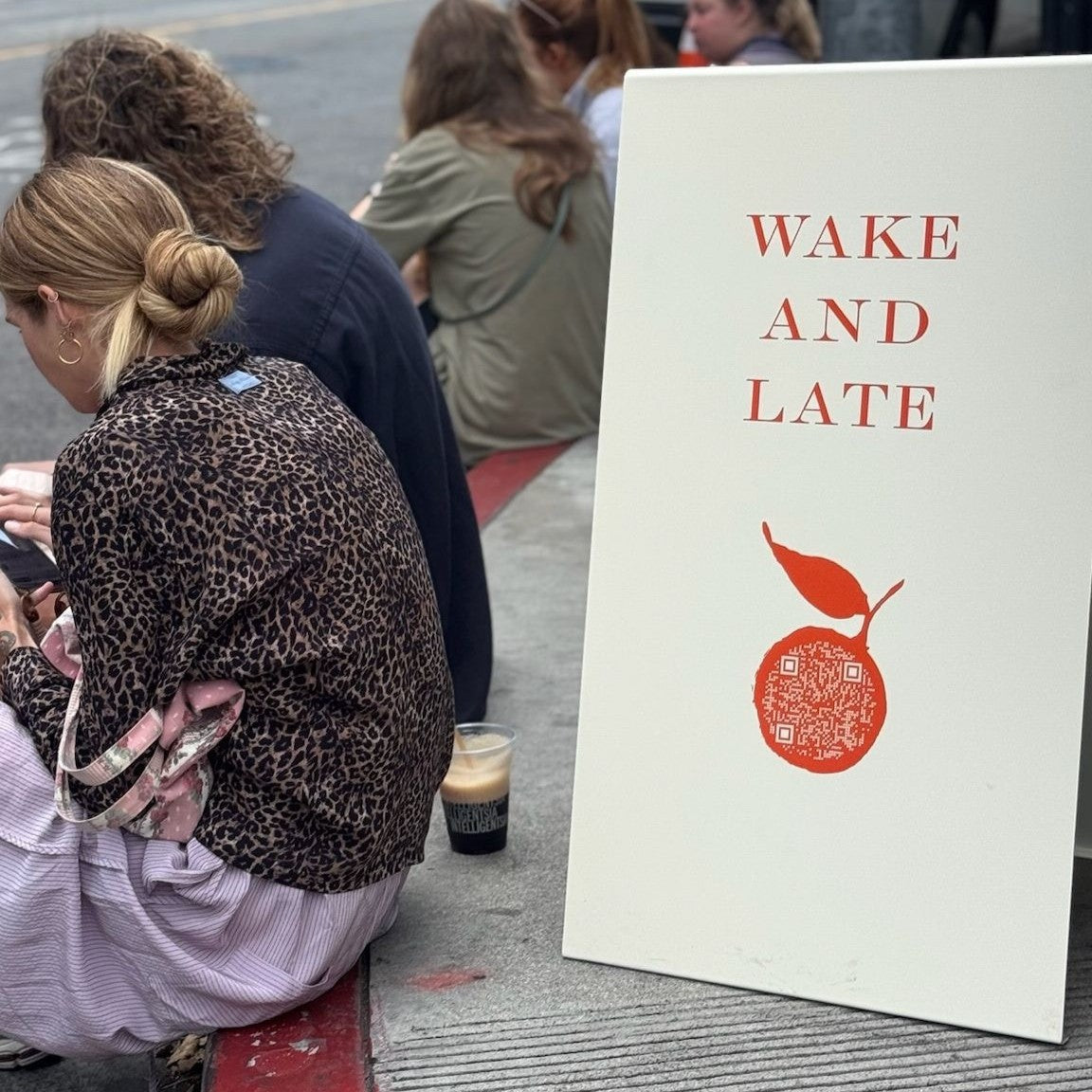 Cream stainless steel A-frame sidewalk sign with neutral tone