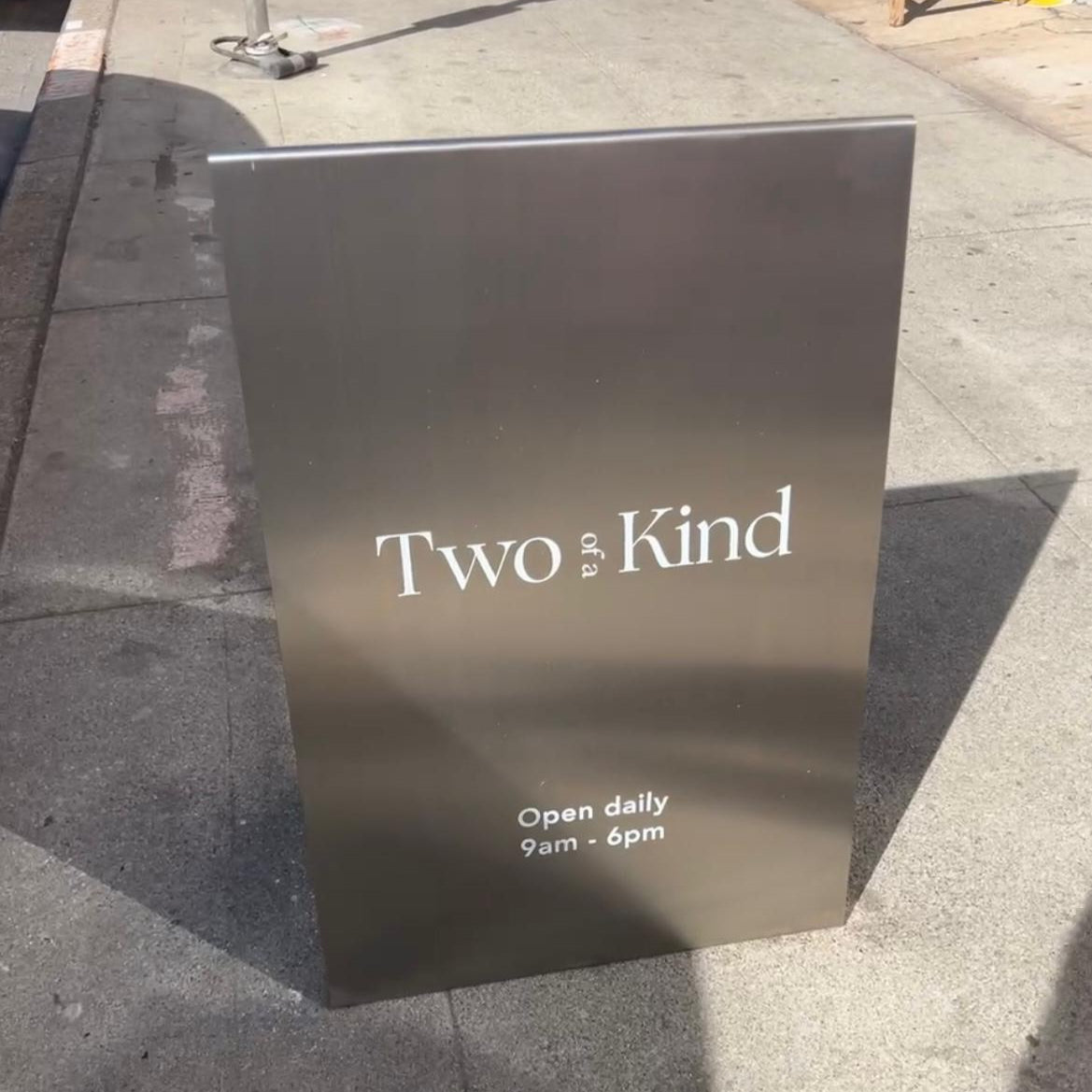 Brushed stainless steel A-frame sidewalk sign with modern finish