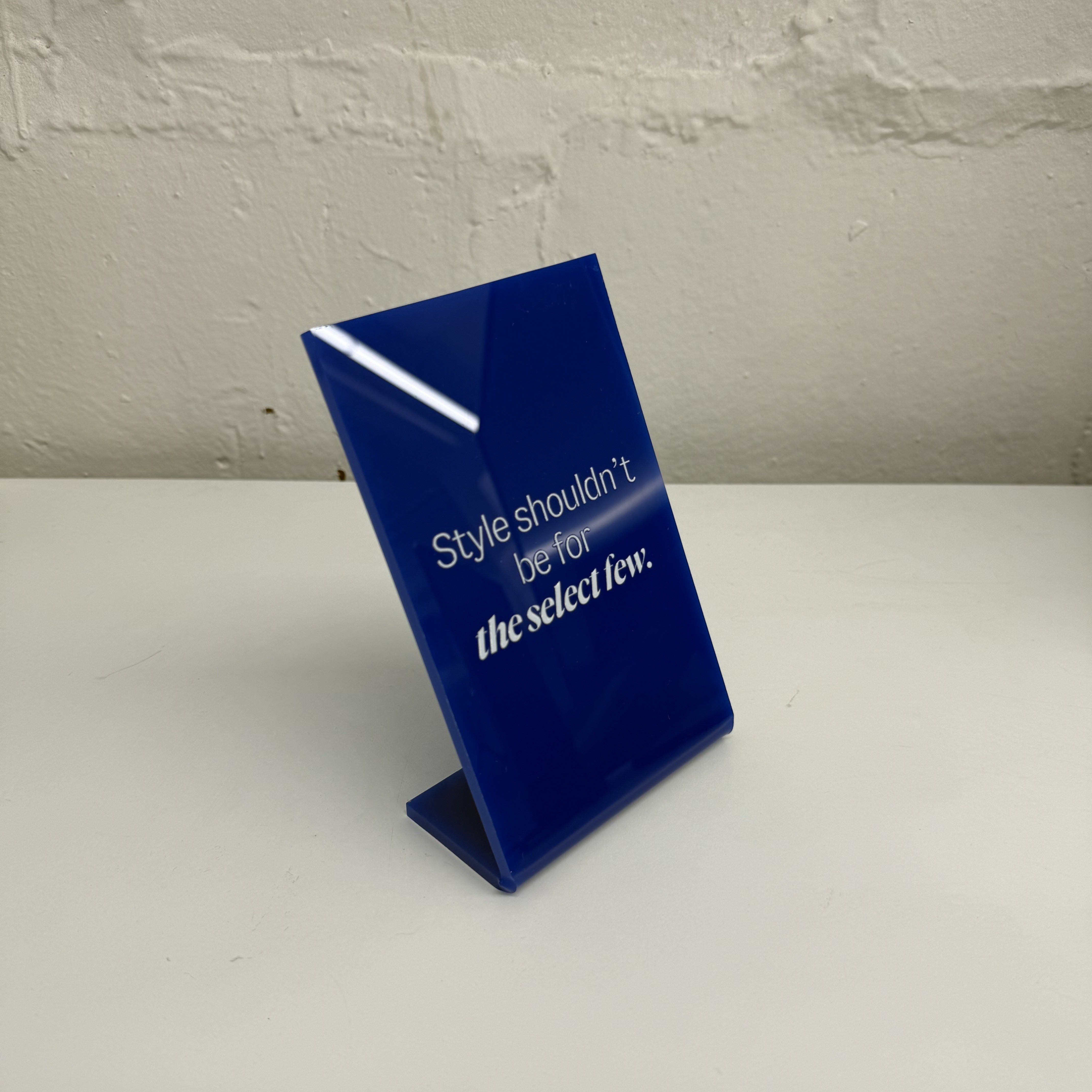 Opaque acrylic table top sign stand with solid finish