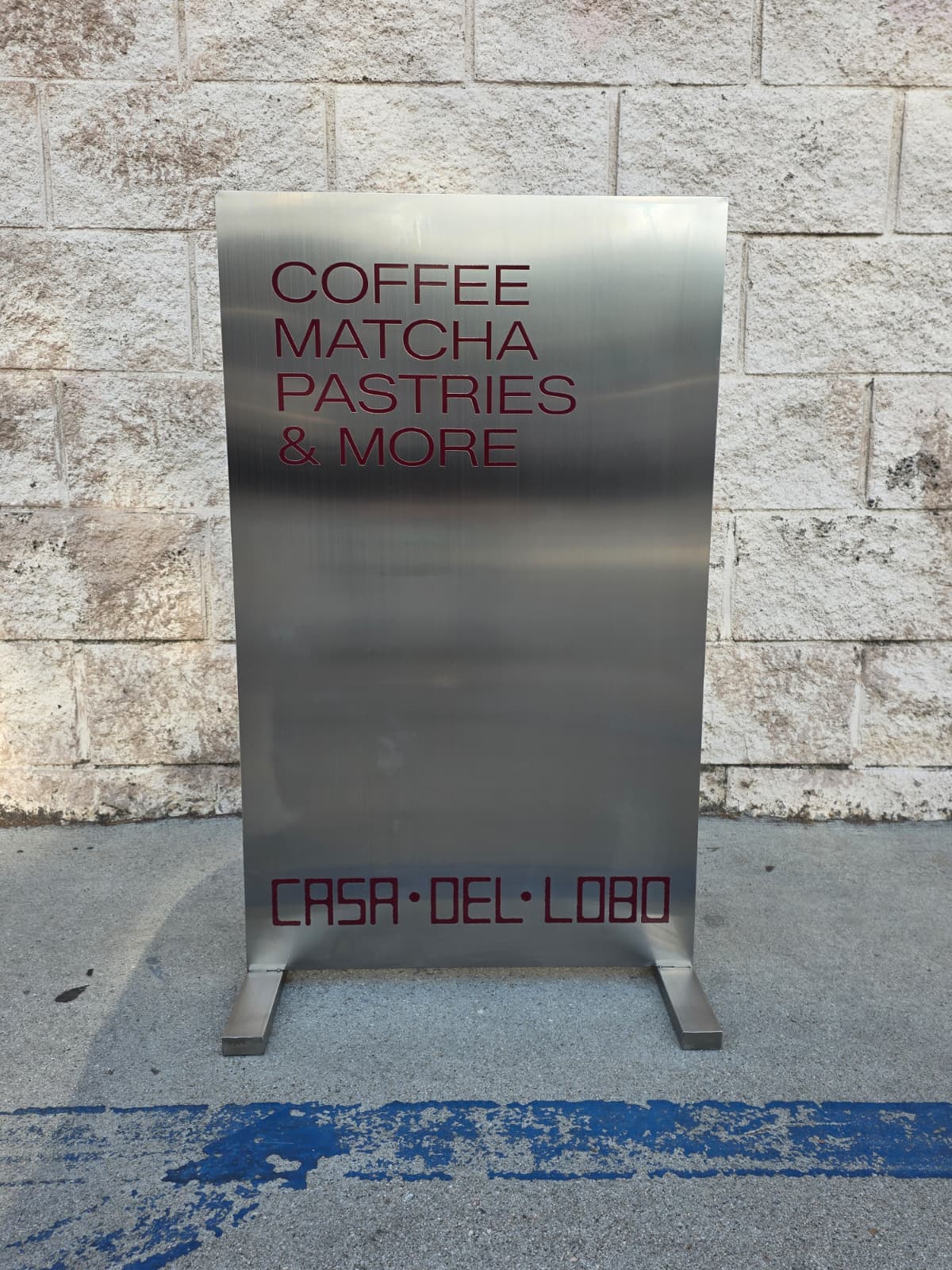 Casa Del Lobo’s Brushed Stainless Steel Sign