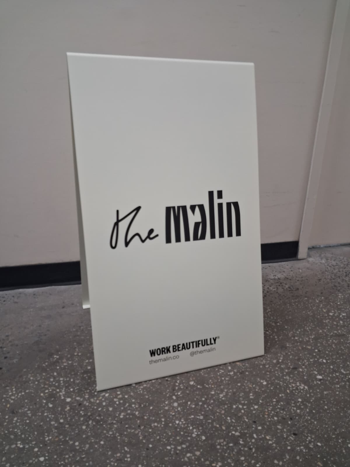 Custom Cream Stainless Steel A-Frame Sign for The Malin