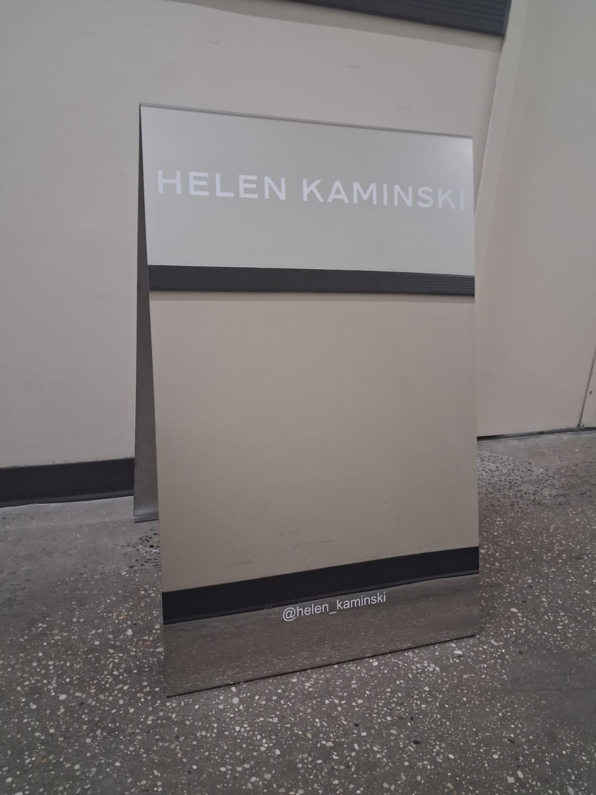 Helen Kaminski Mirrored Stainless Steel Sign