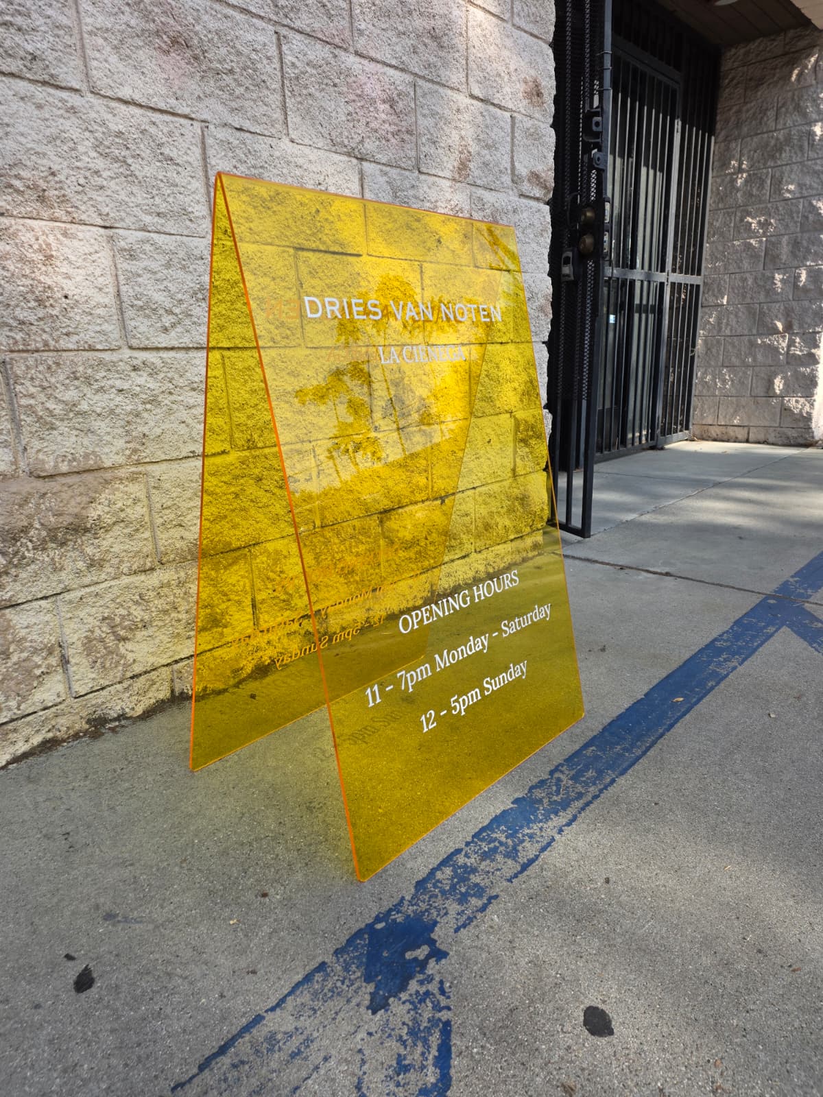 Custom Yellow Acrylic A-Frame Sign for Dries Van Noten