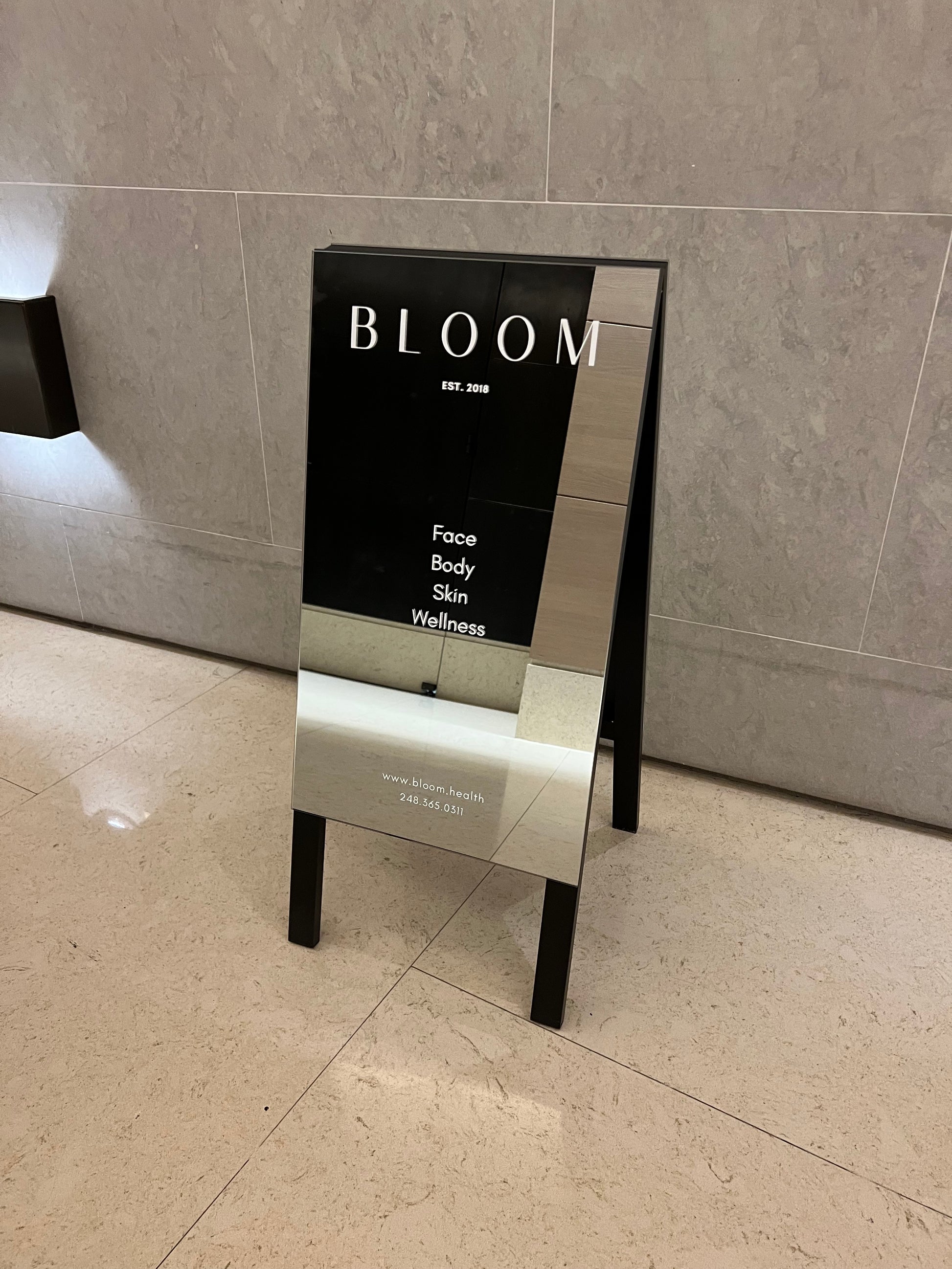 A-Frame Sidewalk Sign Mirrored Bloom Health Face Body Skin Wellness