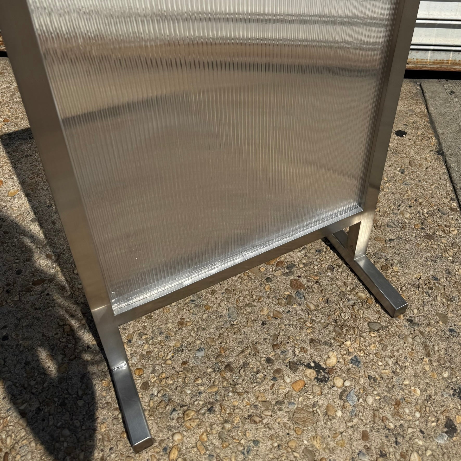 Transparent_Brushed_Stainless_Steel_Standing_Sign_Bottom_Detail_View