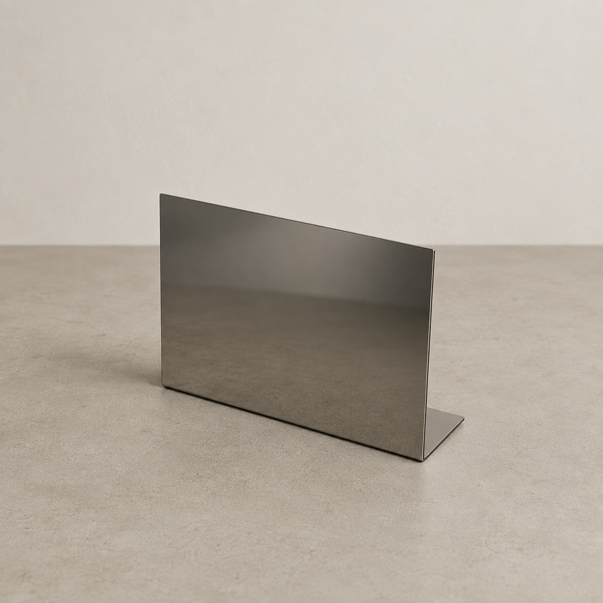 Landscape mirrored stainless steel tabletop stand shown at an angle.